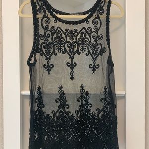 Black lace and appliqué top